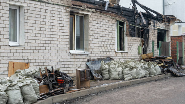 Professional Fire Damage Restoration technician working in Grenloch, NJ